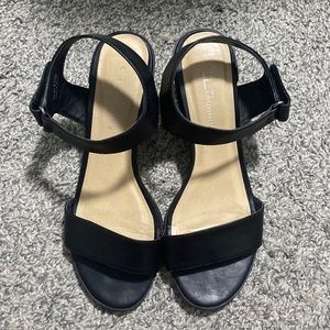 2-3/4” heeled, black strappy sandals; used; scuff marks on heels (see photos)